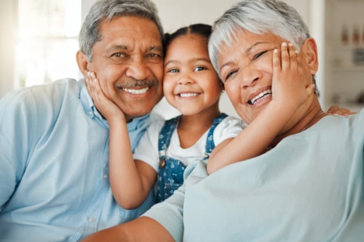 Happy couple with granddaughter